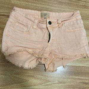 Pale orange jean shorts
